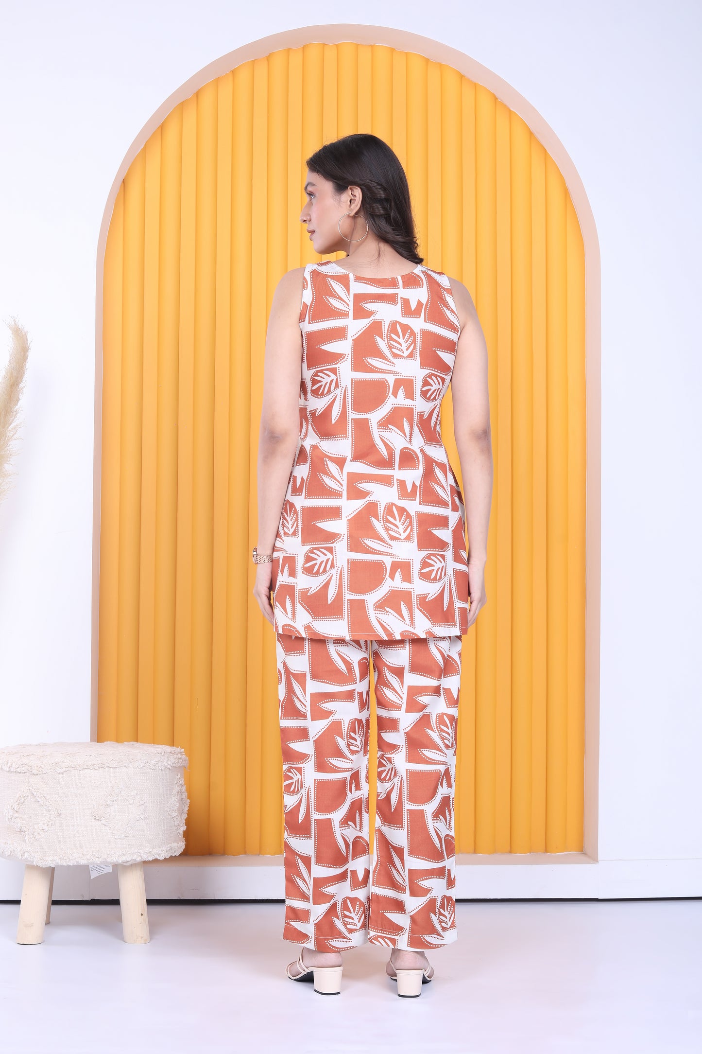 Orange leaf printed co-ord set with sleeveless top